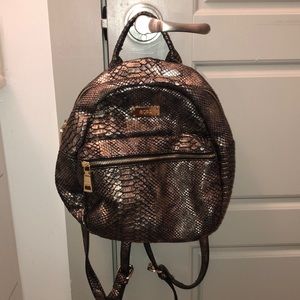 BCBG chrome backpack